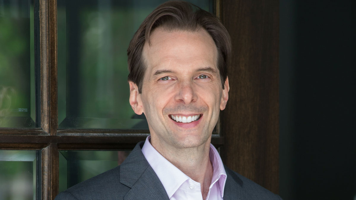 Keynote speaker engaging a live event audience